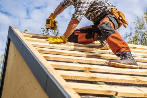professional drilling on wooden roof